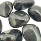 Rear view of Rainbow Obsidian tumbled stone, showing natural inclusions.