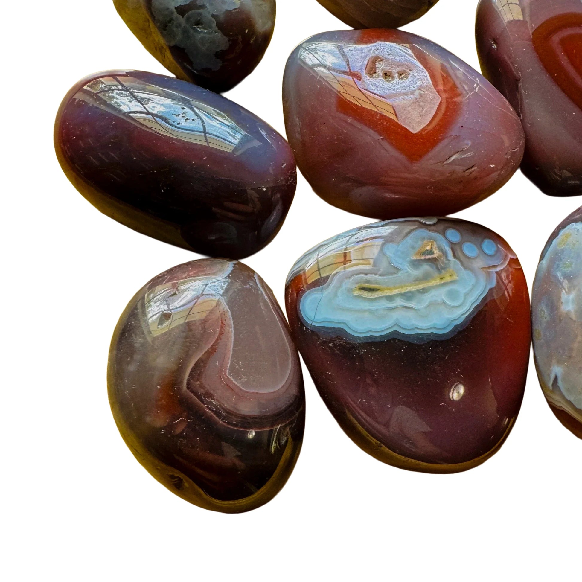 Underside detail of Red Agate tumbled stone, traditionally used for Grounding.