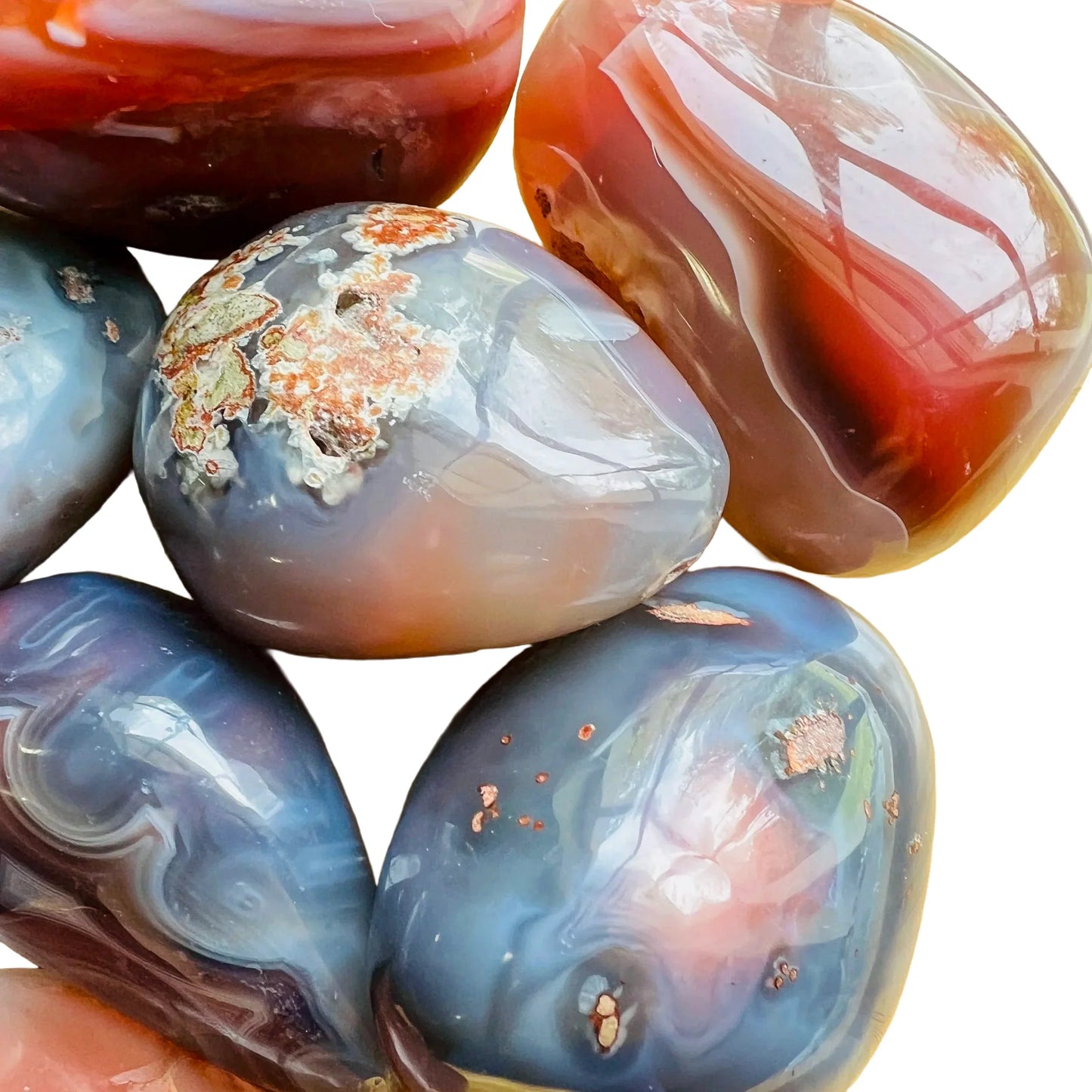 Reverse angle of Grade AA Red Agate palm stone, showing soft luster.