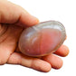 Full profile of Grade AA Red Agate palm stone ready to ship from Beyond Bohemian