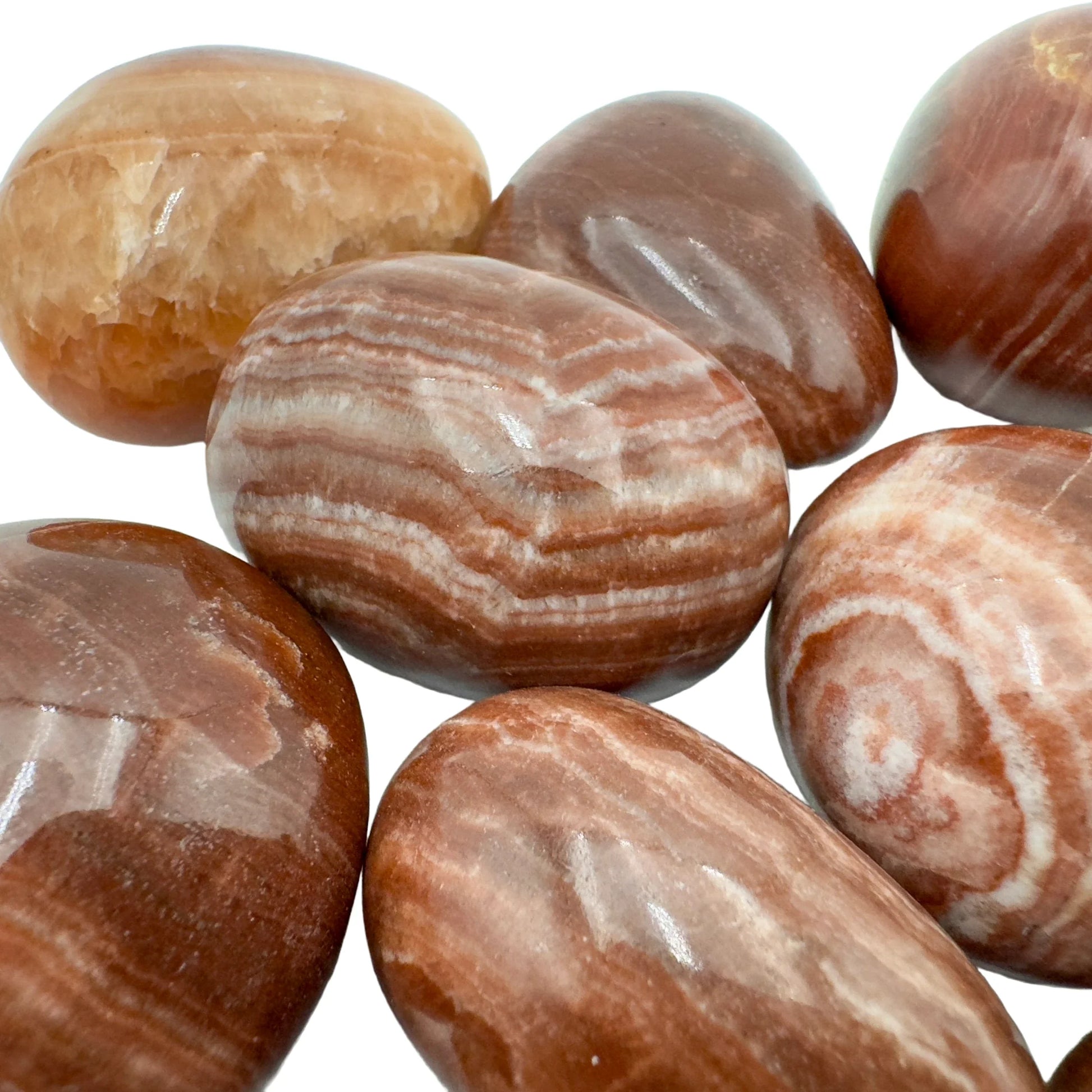 Underside detail of Red Aragonite tumbled stone, for Energy.