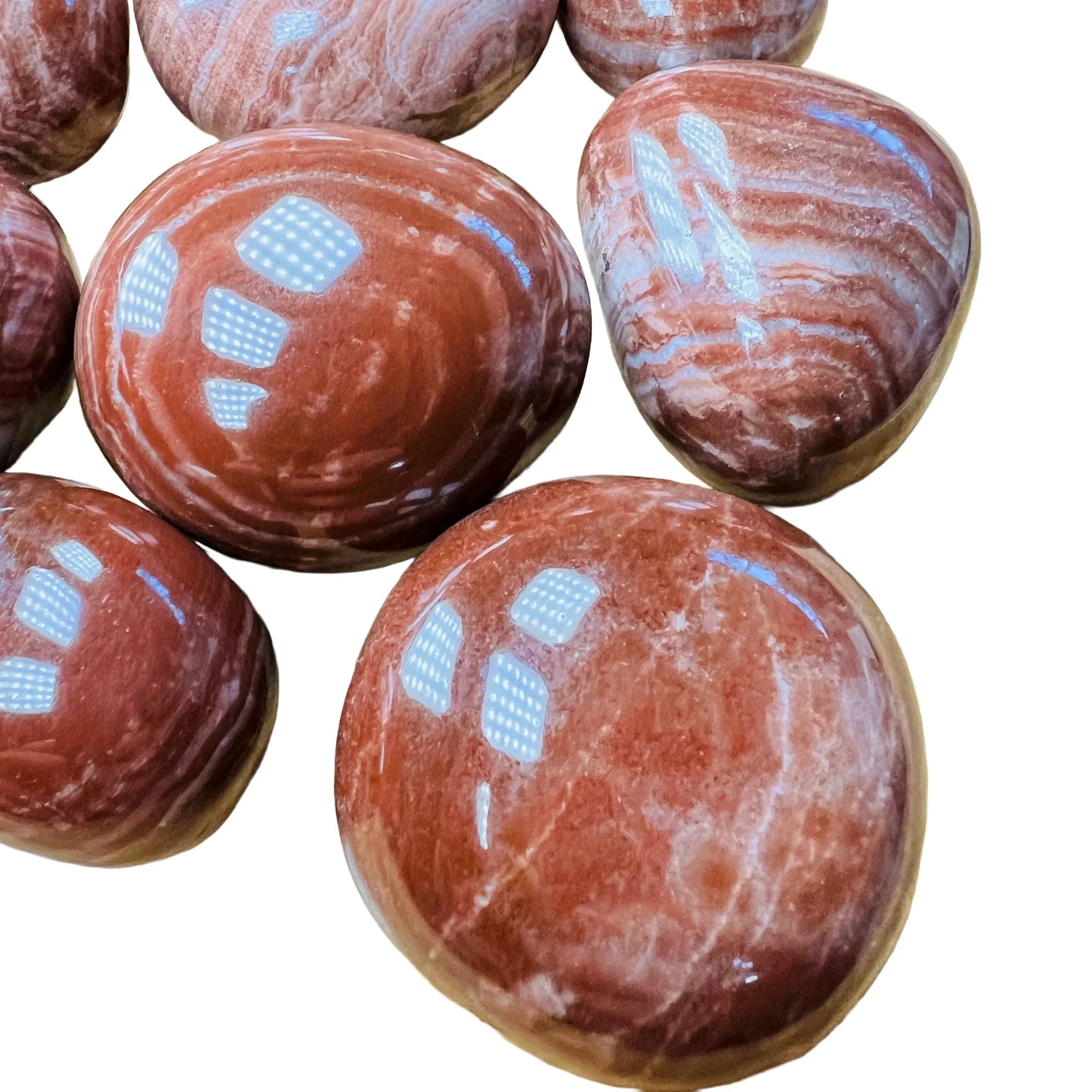 Full profile of Grade AAA Red Aragonite tumbled stone ready to ship from Beyond Bohemian