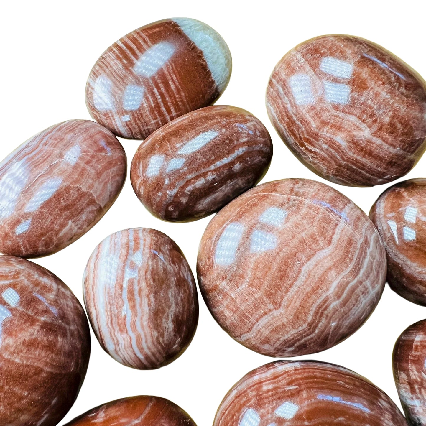 Full profile of Grade AAA Red Aragonite tumbled stone ready to ship from Beyond Bohemian