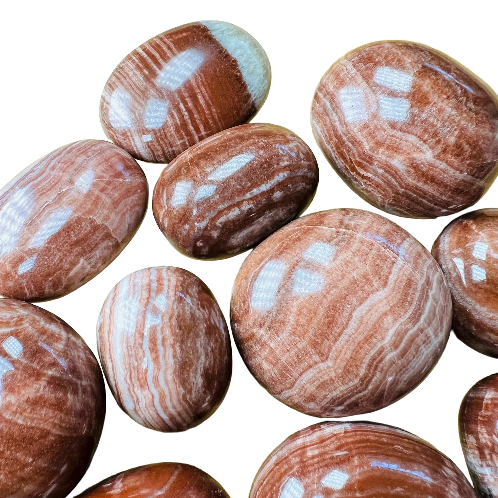 Full profile of Grade AAA Red Aragonite tumbled stone ready to ship from Beyond Bohemian