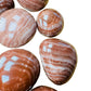 Full profile of Grade AAA Red Aragonite tumbled stone ready to ship from Beyond Bohemian