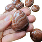 Full profile of Grade AAA Red Aragonite tumbled stone ready to ship from Beyond Bohemian