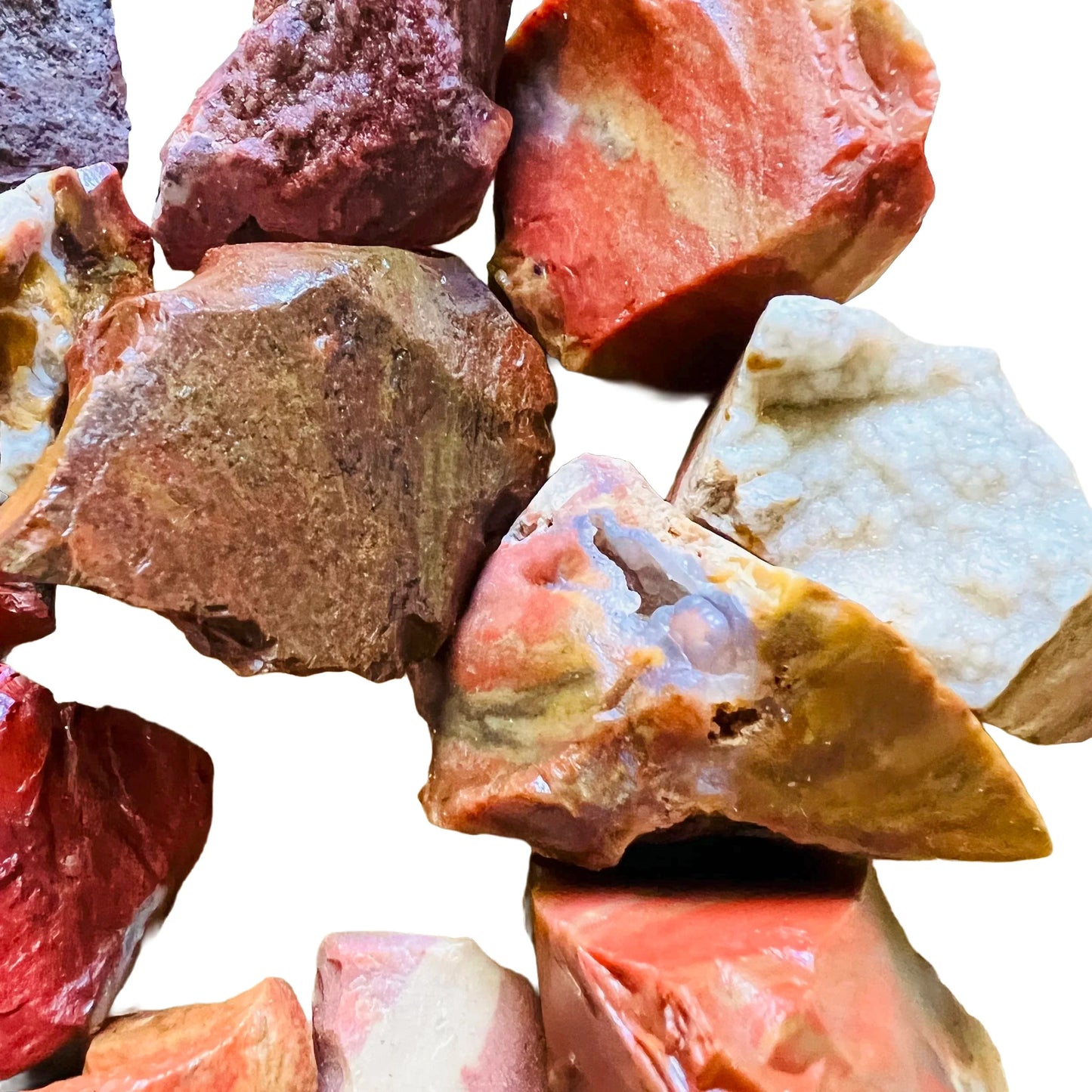 Overhead view of Red Jasper raw stone, Madagascar-sourced, to support Grounding.