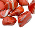 Edge-on view of Grade AA Red Jasper tumbled stone, hand-selected from Northern Cape, South Africa, showing earthy tone.