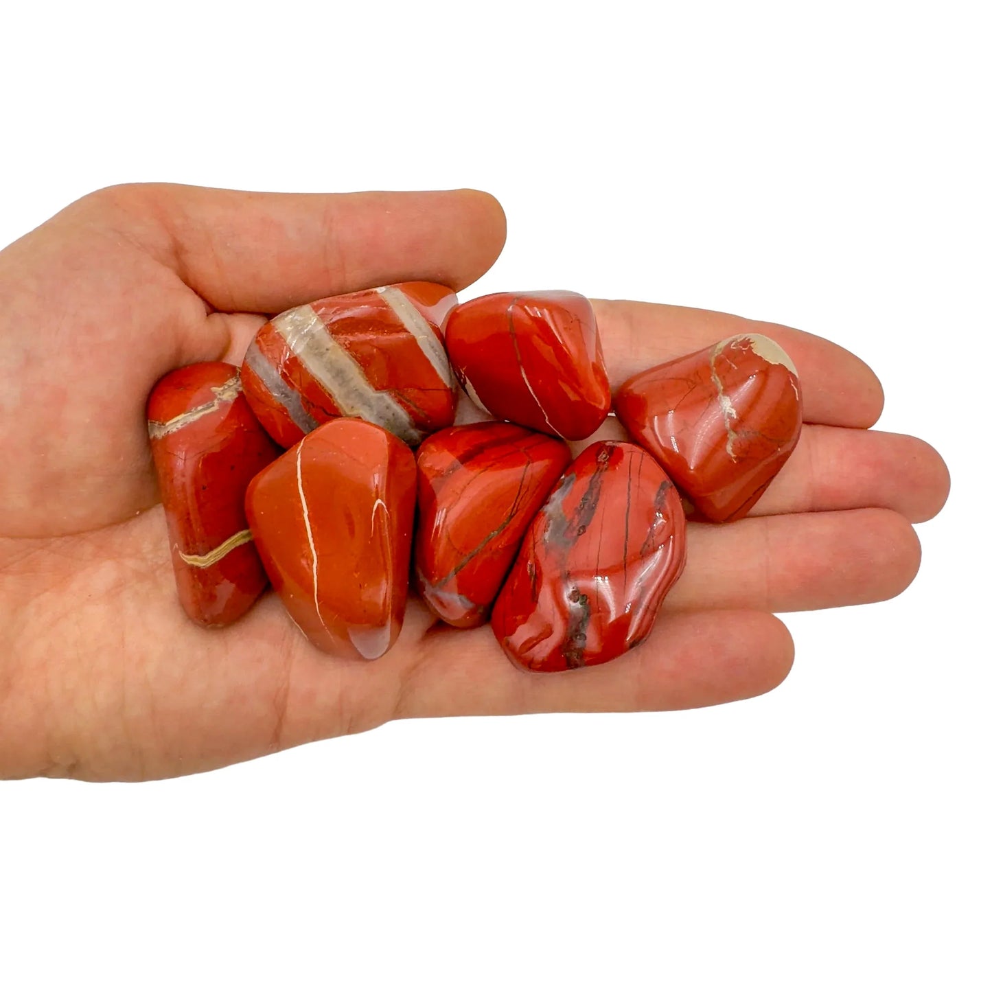Back view of Grade AA Red Jasper tumbled stone showing natural surface