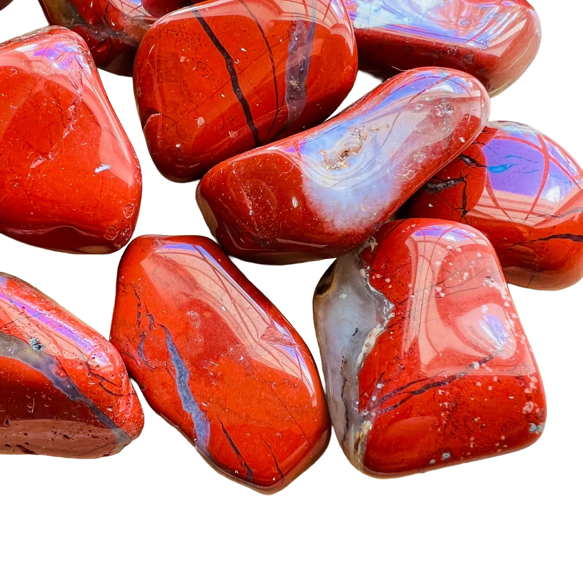 Looking down on Red Jasper tumbled stone, showing natural inclusions.