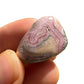Full profile of Grade A Rhodochrosite tumbled stone ready to ship from Beyond Bohemian