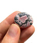 Full profile of Grade A Rhodochrosite tumbled stone ready to ship from Beyond Bohemian