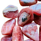 Back view of Rhodochrosite tumbled stone, sourced from Argentina.