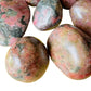 Looking down on Rhodonite freeform, showing matte finish.