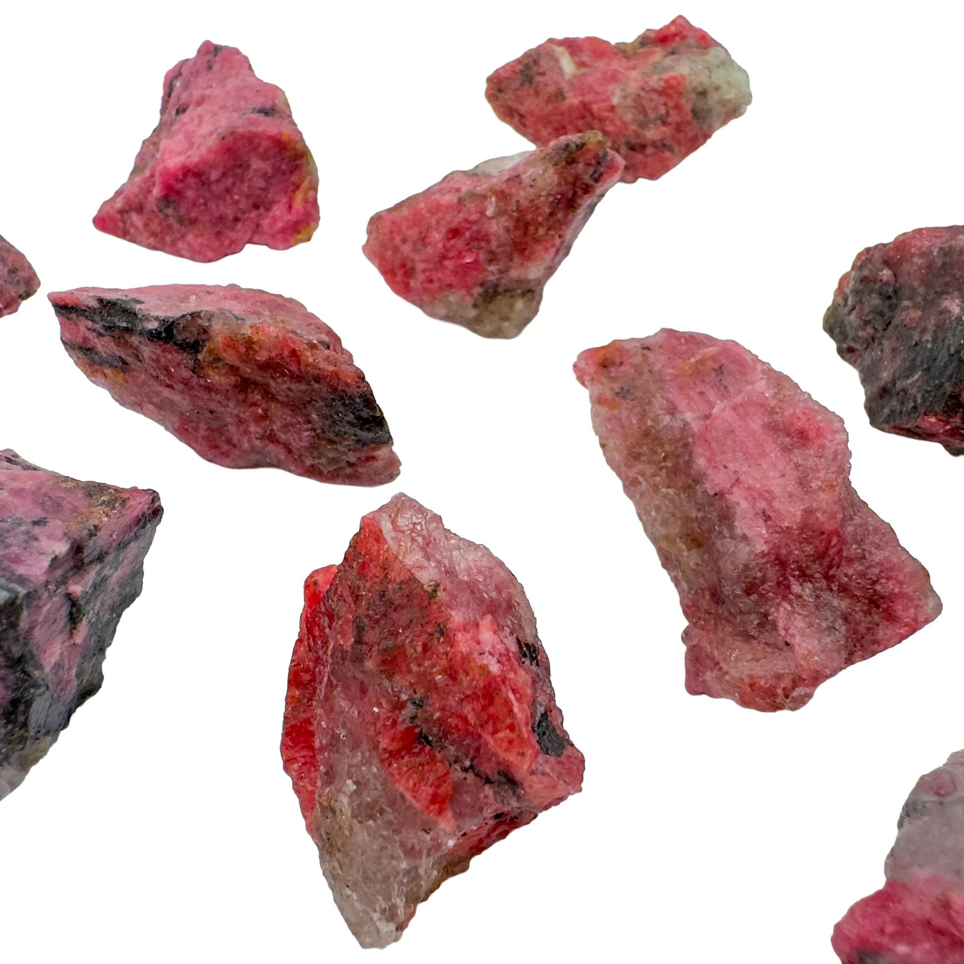 Detail shot of Grade AA Rhodonite raw under natural light
