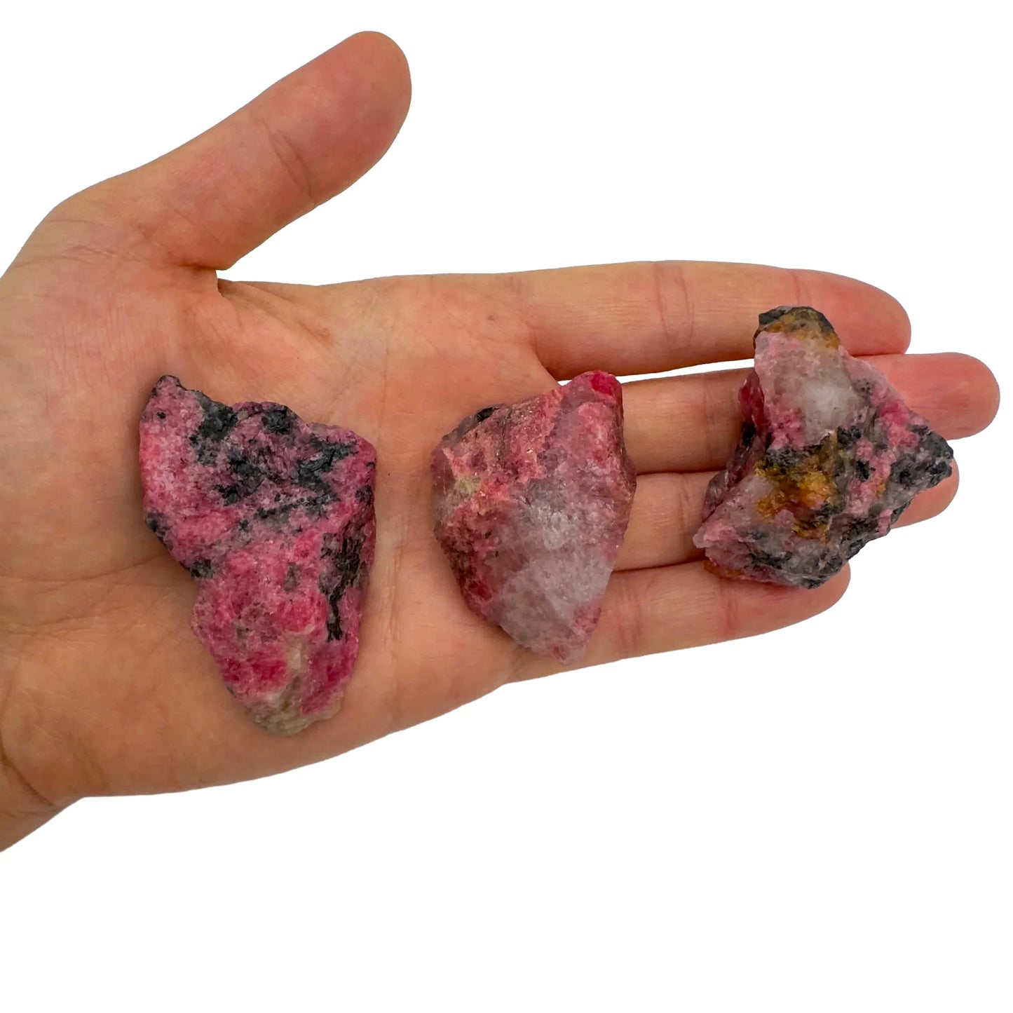 Back view of Grade AA Rhodonite raw showing natural surface