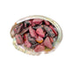Tight crop of pink Rhodonite tumbled stone, Zimbabwe-sourced, showing characteristic patterning.