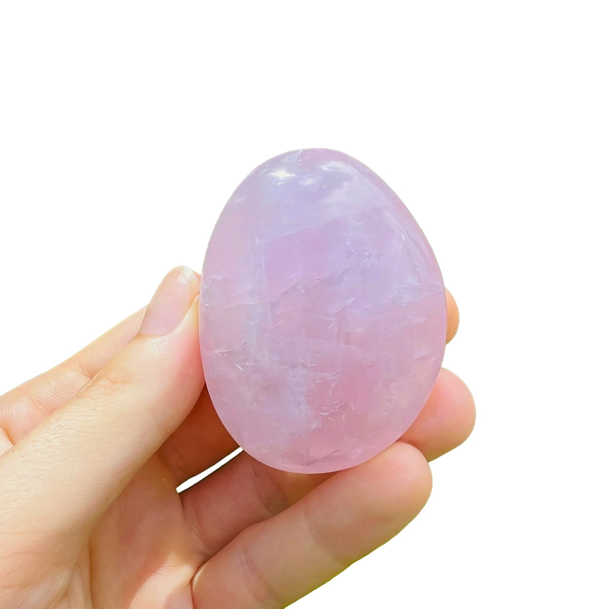 Aerial view of Rose Quartz palm stone, hand-selected from Alaotra-Mangoro, Madagascar, showing natural sheen.
