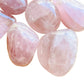 Underside view of pink Rose Quartz palm stone, kept close for Love, sourced from Madagascar.