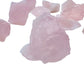Profile view of Rose Quartz raw stone, turned to for Love.