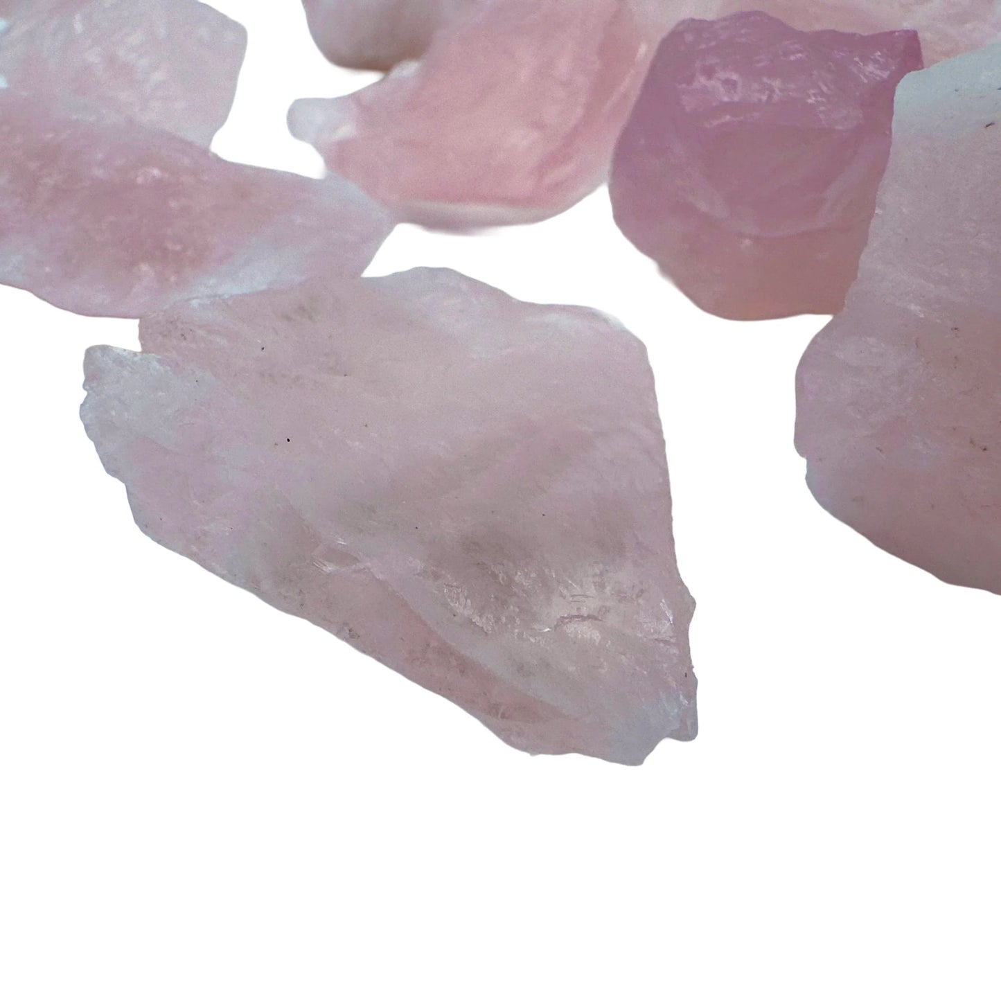 Top-side view of Rose Quartz raw stone, associated with Love.