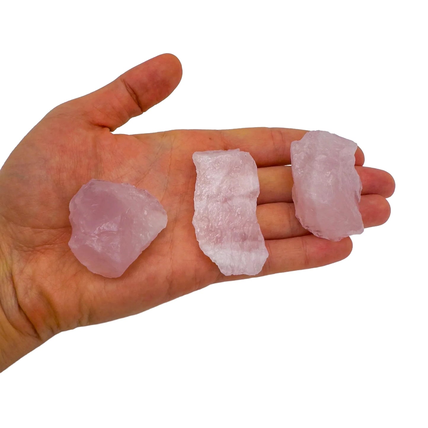 Detail shot of Grade AA Rose Quartz raw under natural light