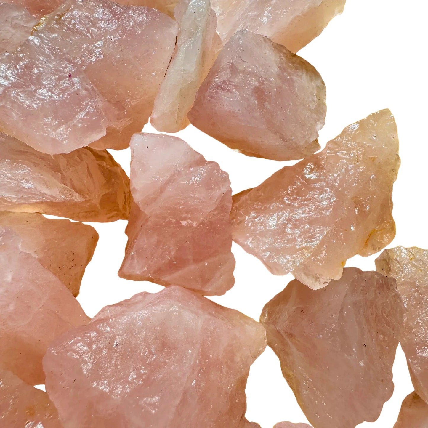 Texture-level view of pink Rose Quartz raw stone, showing natural inclusions, to support Love.