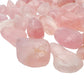 Top angle of Rose Quartz tumbled stone, showing glassy finish.