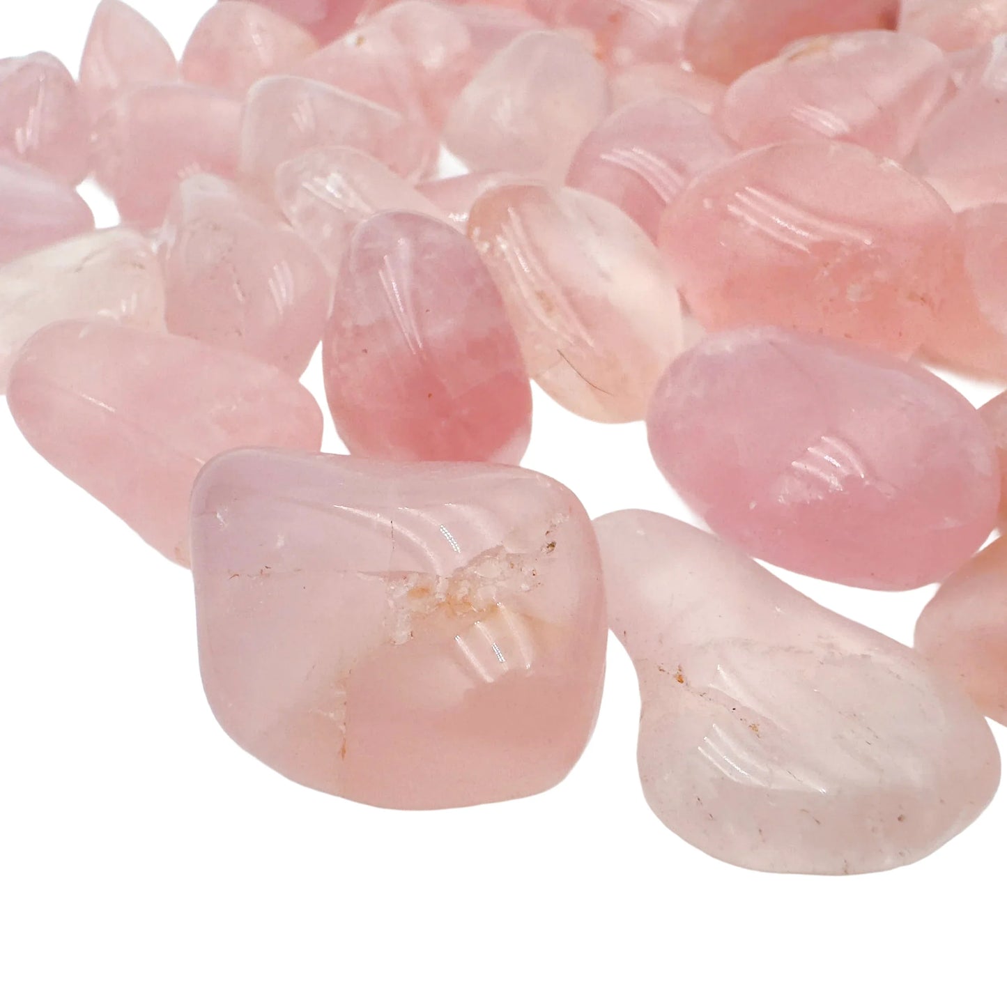 Top angle of Rose Quartz tumbled stone, showing glassy finish.