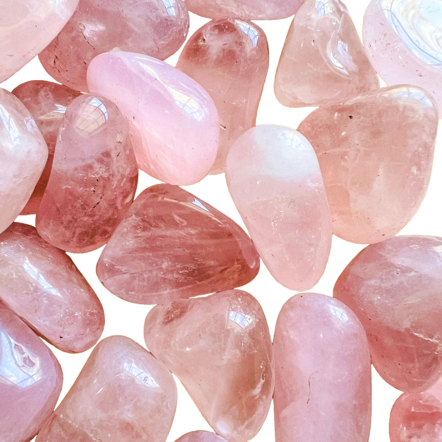 Back view of Grade AA Rose Quartz tumbled stone showing natural surface