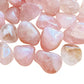 Detail capture of Rose Quartz tumbled stone, showing soft luster, sourced from Brazil.