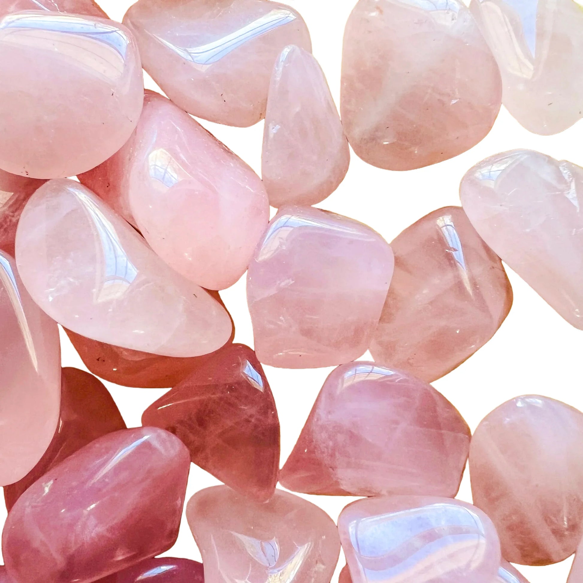 Overhead angle of Rose Quartz tumbled stone, showing characteristic color, often paired with practices around Love.
