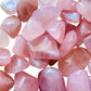 Underside detail of Grade AA Rose Quartz tumbled stone, sourced from Madagascar.