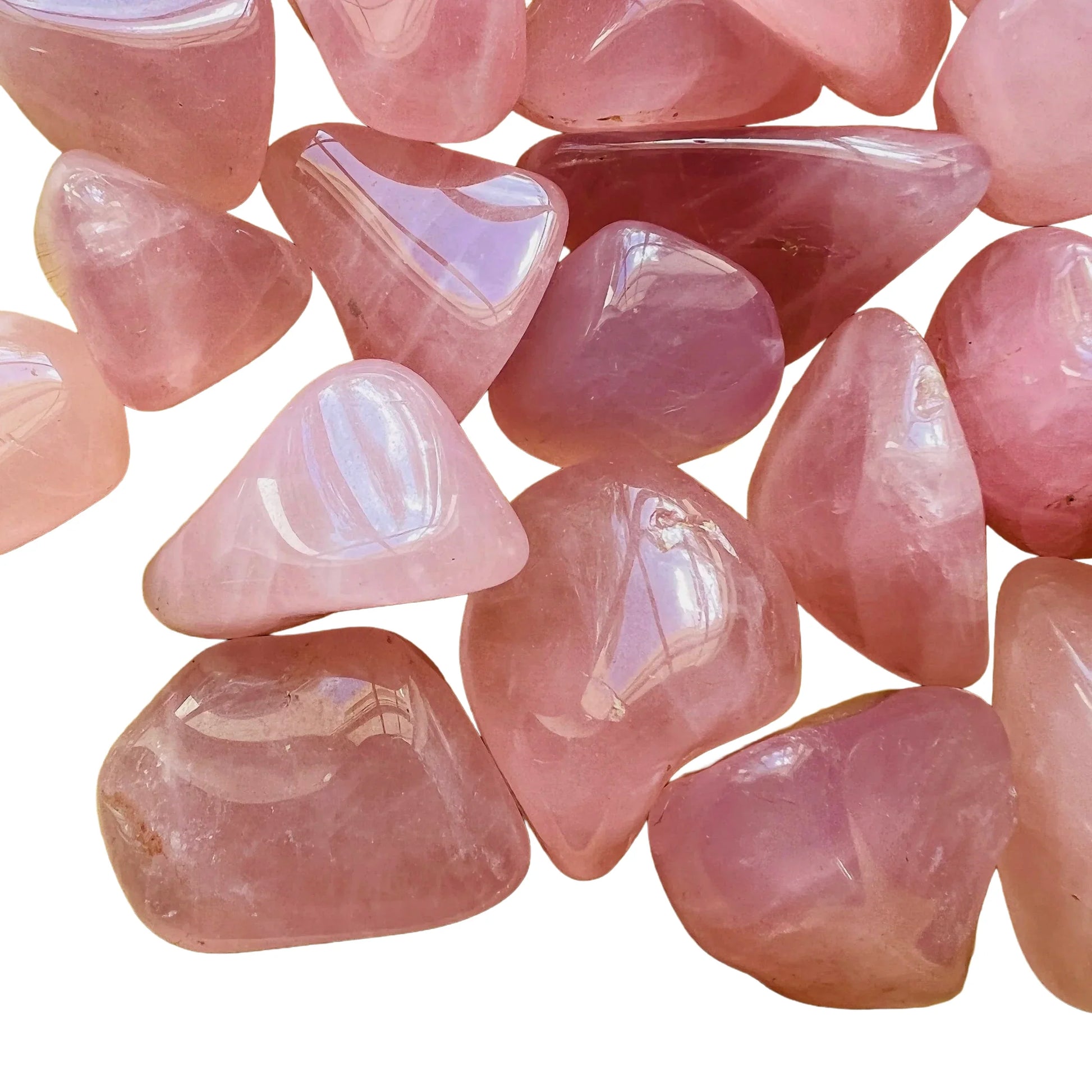 Color detail of pink Rose Quartz tumbled stone, Madagascar-sourced, to support Love.