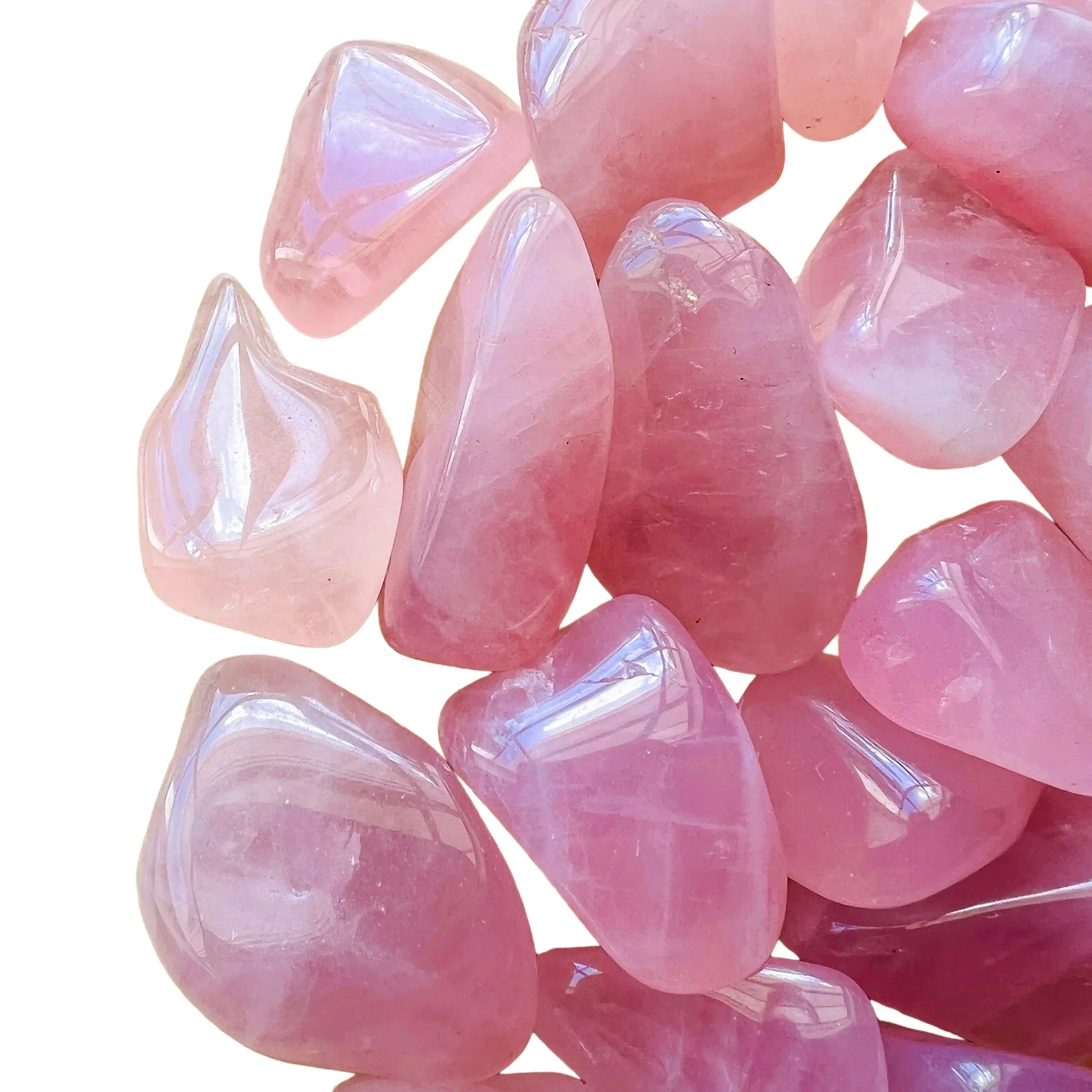 Profile shot of Grade AA pink Rose Quartz tumbled stone, from Vakinankaratra, Madagascar, showing glassy finish.
