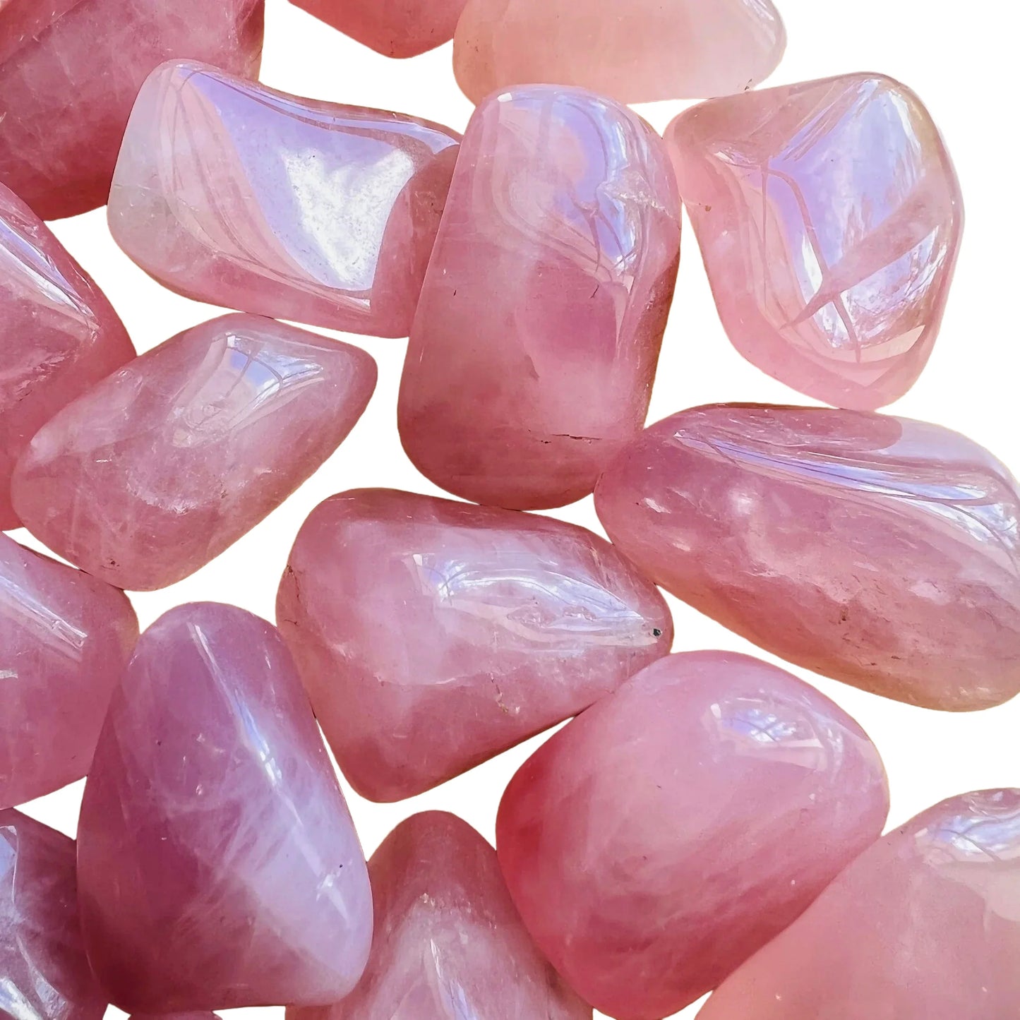 Reverse angle of Rose Quartz tumbled stone, showing soft luster, turned to for Love.