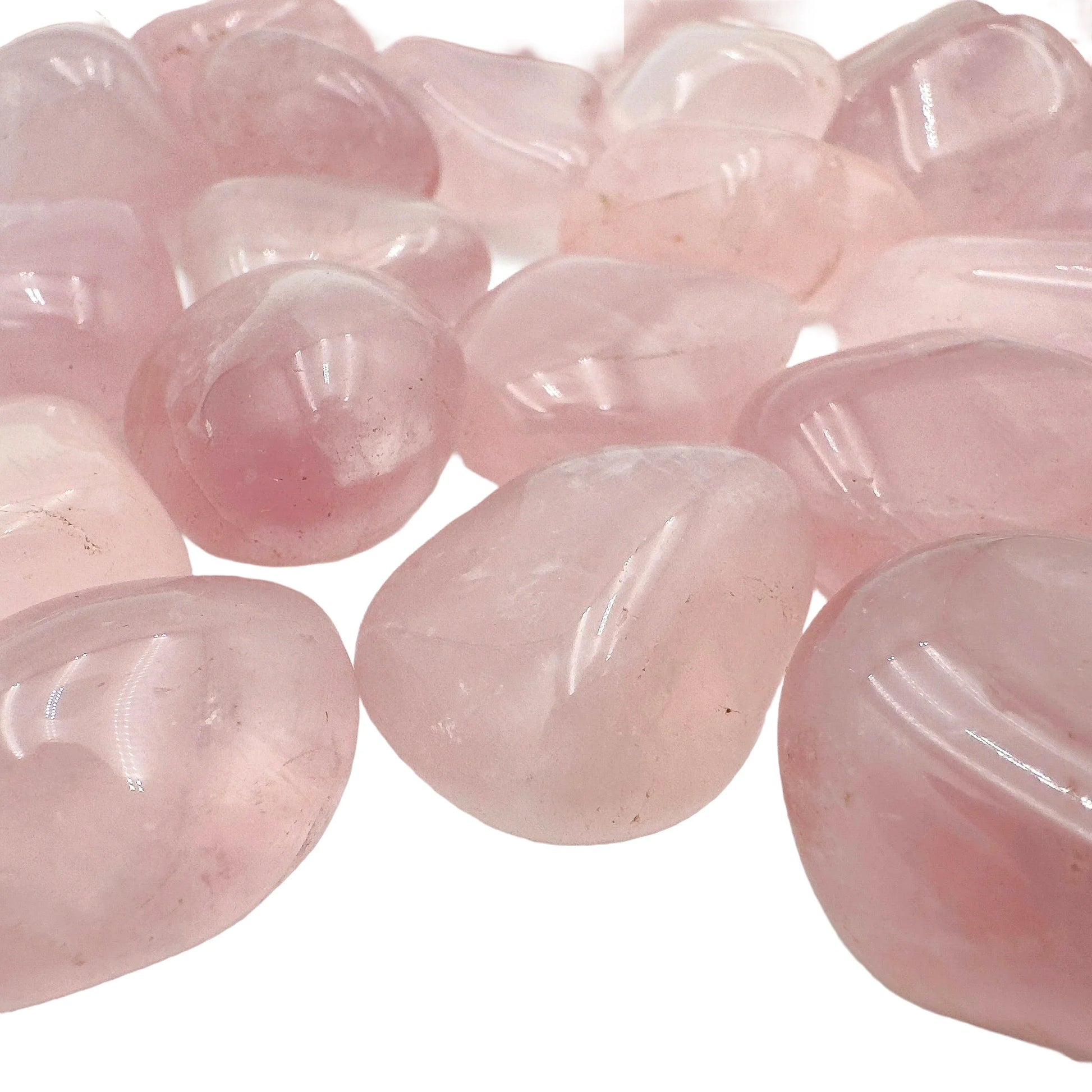Top view of Grade AAA Rose Quartz tumbled stone, showing characteristic patterning.