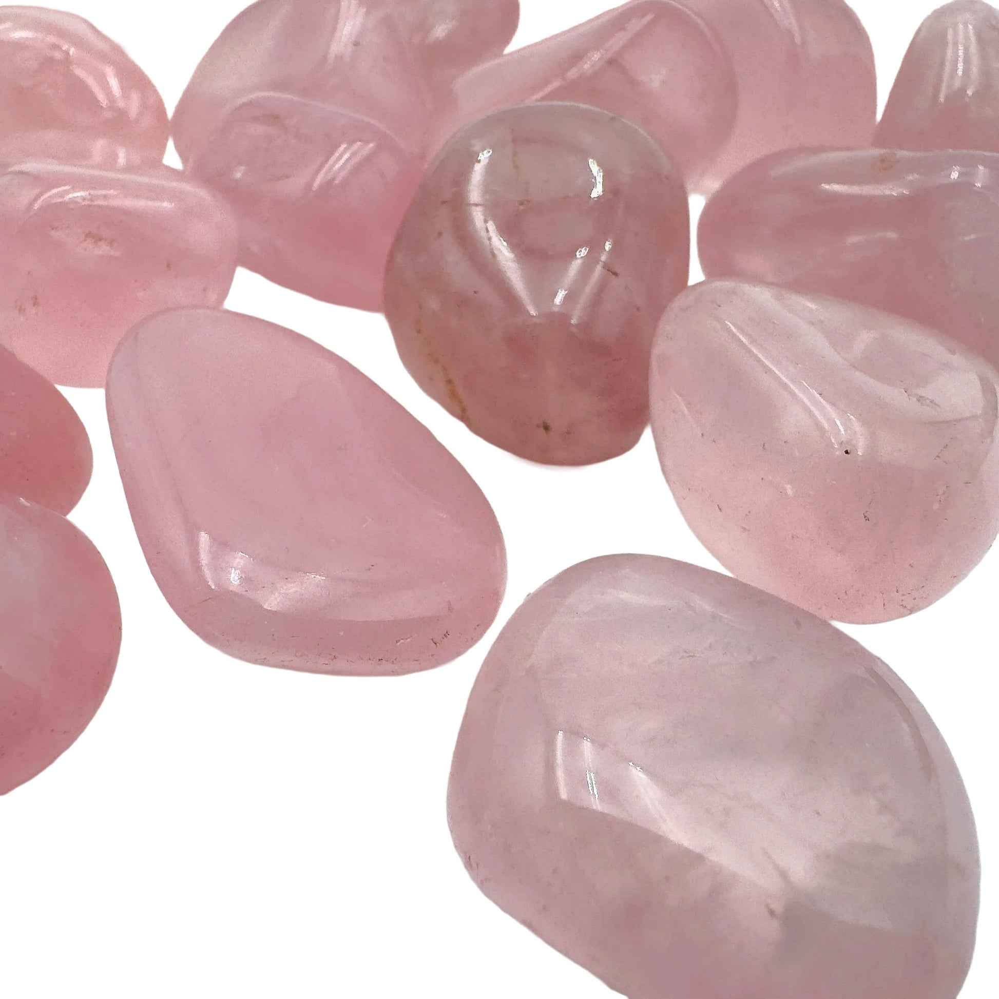 Underside view of Rose Quartz tumbled stone, showing translucent edges.