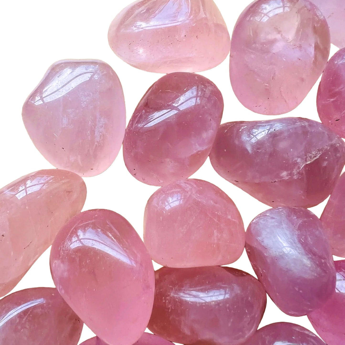 Side perspective of Rose Quartz tumbled stone, linked to Love, hand-selected from Minas Gerais, Brazil.
