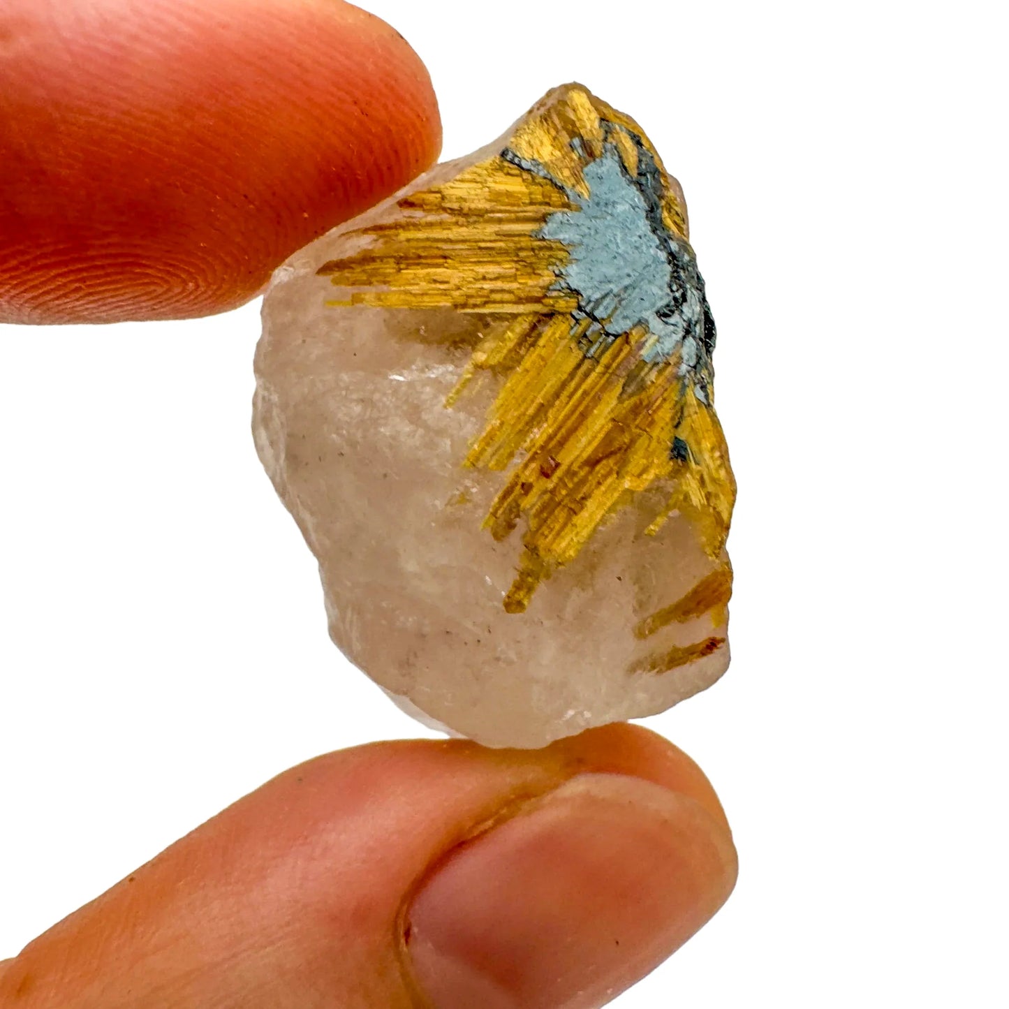 Set against a soft backdrop is a Quartz raw crystal, from Minas Gerais, Brazil, in the warmth of daylight.