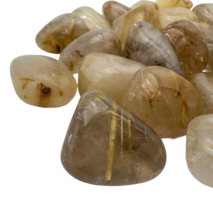 Texture-level view of Grade AA Quartz tumbled stone, Brazil-sourced.
