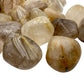 Profile shot of clear Quartz tumbled stone, to support Cleansing and Meditation, Brazil-sourced.