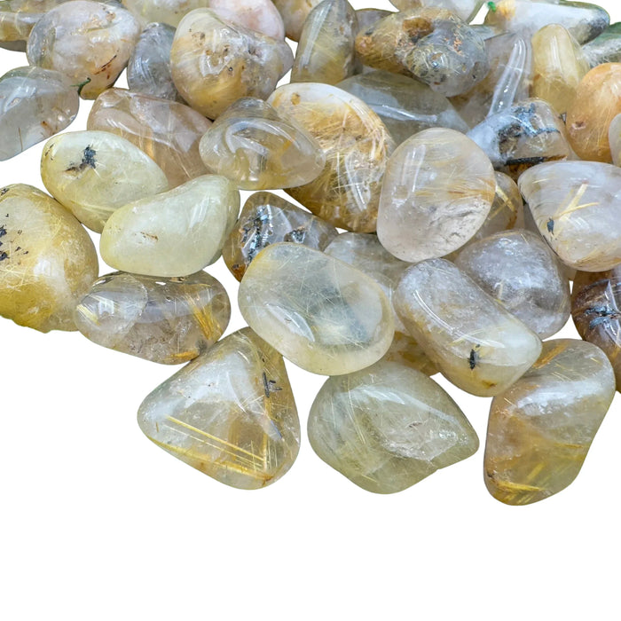 Detail shot showing Grade AAA Quartz tumbled stone, showing natural variation.