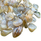 Side angle of clear Quartz tumbled stone, showing soft luster, from Brazil.