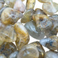 Underside detail of Quartz tumbled stone, showing matte finish, from Minas Gerais, Brazil.