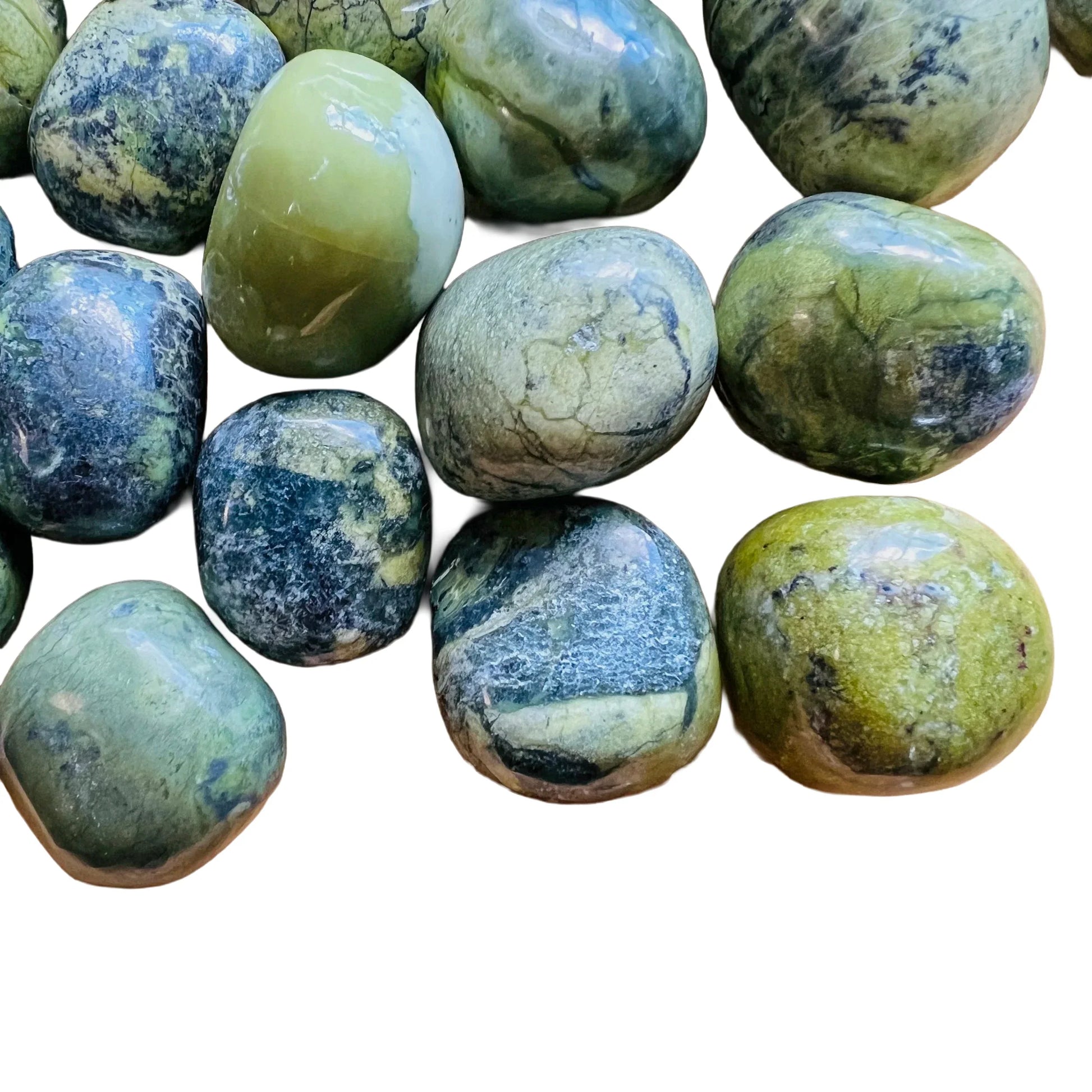 Side-on view of Grade AA Serpentine tumbled stone, sourced from Junín, Peru.
