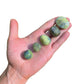 Full profile of Grade AA Serpentine tumbled stone ready to ship from Beyond Bohemian