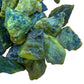 Bird's-eye view of green Serpentine raw stone, worked with for Healing, sourced from Peru.
