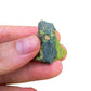 Soft-light view of Serpentine raw crystal, from Junín, Peru, with hand-sized presence.
