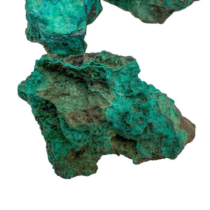 Close-up of Chrysocolla raw stone, often paired with practices around Emotional Healing.